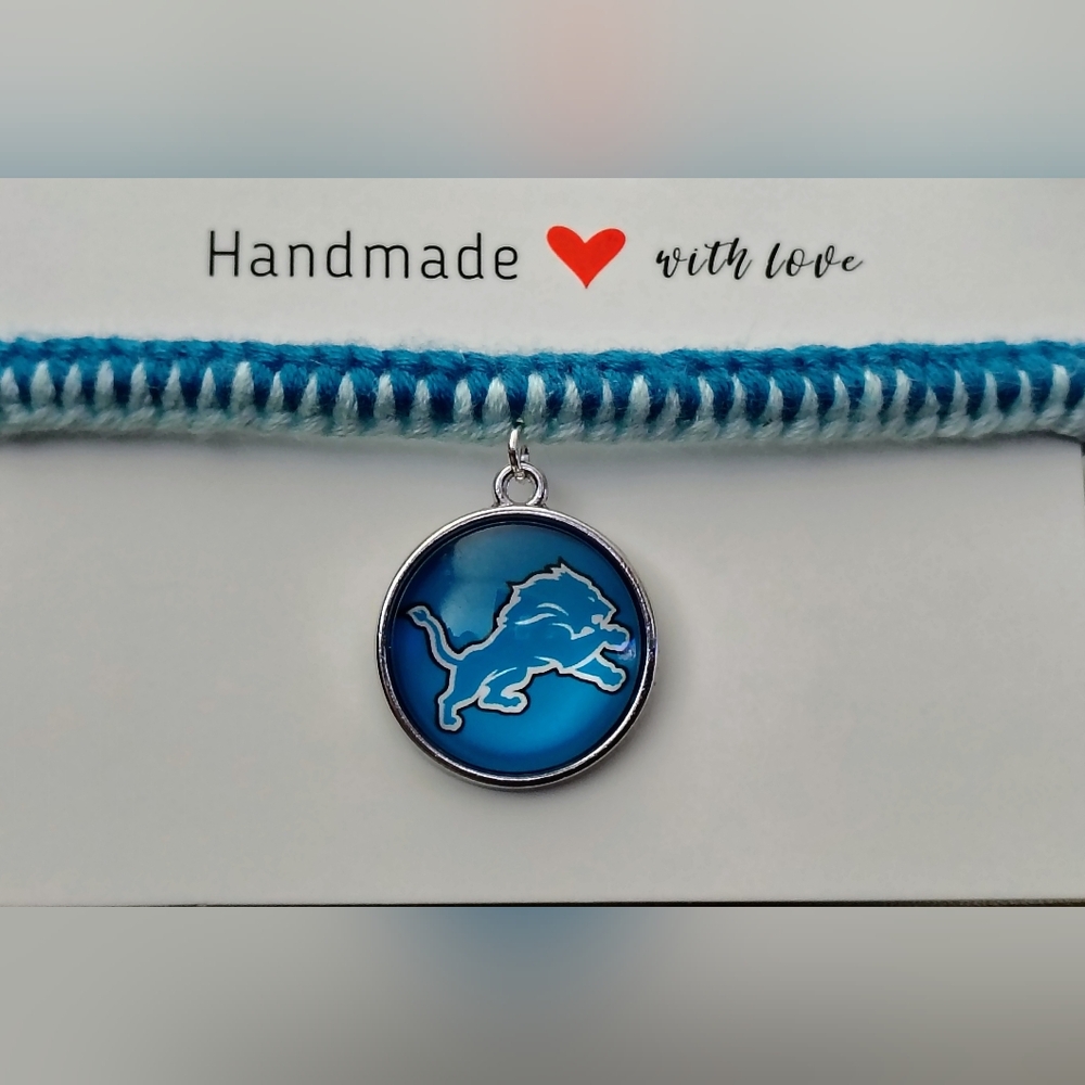 Blue and White Handmade Bracelet with Lion Charm